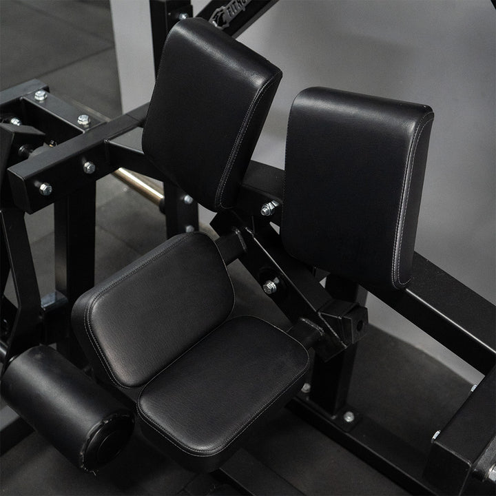 Curl Femoral Iso-Lateral | Máquina de Palanca - Compact Series asiento